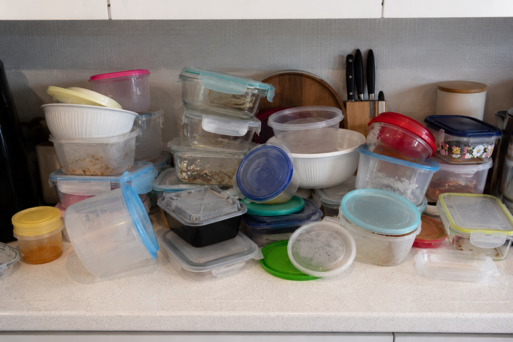 Containers stacked poorly with wasted cabinet space